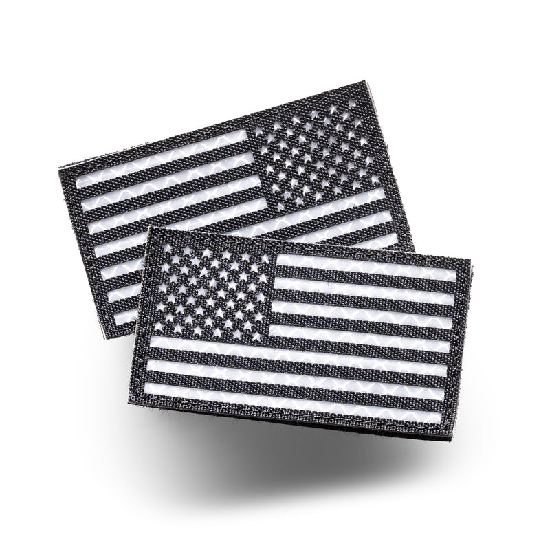 Black subdued IR reflective American flag patches, forward and reverse orientation, hook-and-loop backing