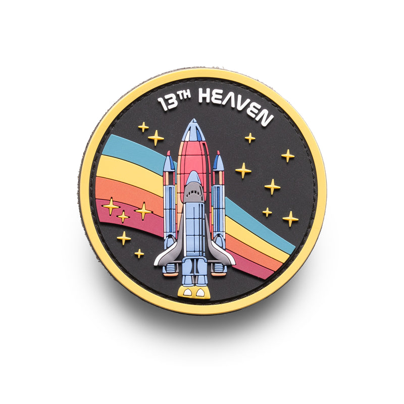 13th Heaven Co. A-13 PVC morale patch — retro rocket launch design on black background with gold border, 3 inches tall